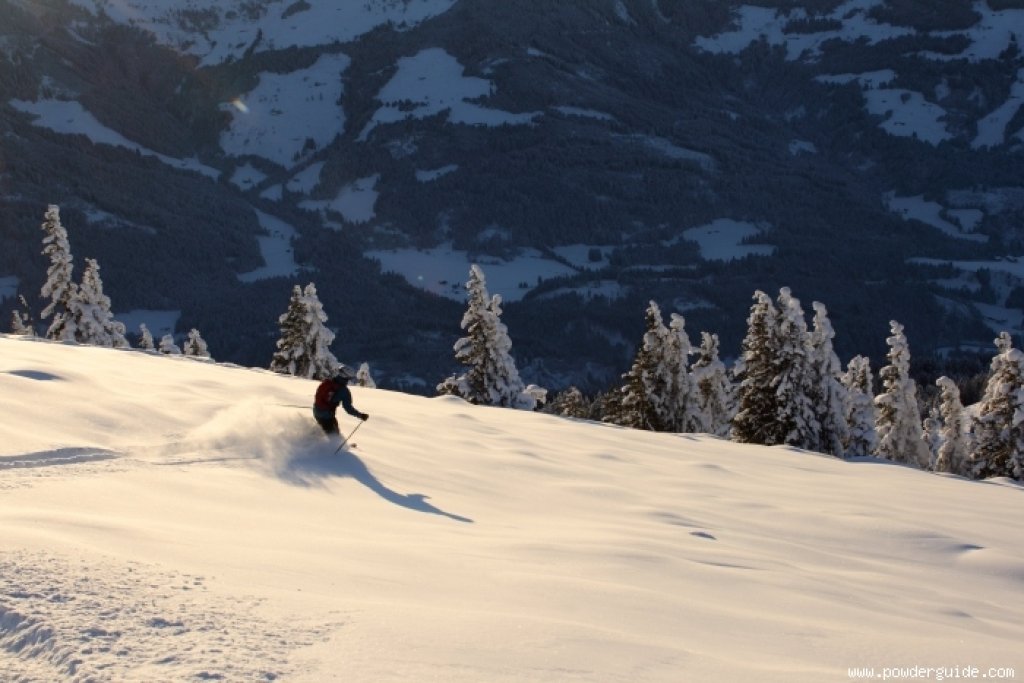 Skiing in on gentle alpine meadows for the steep gullies and couloirs.