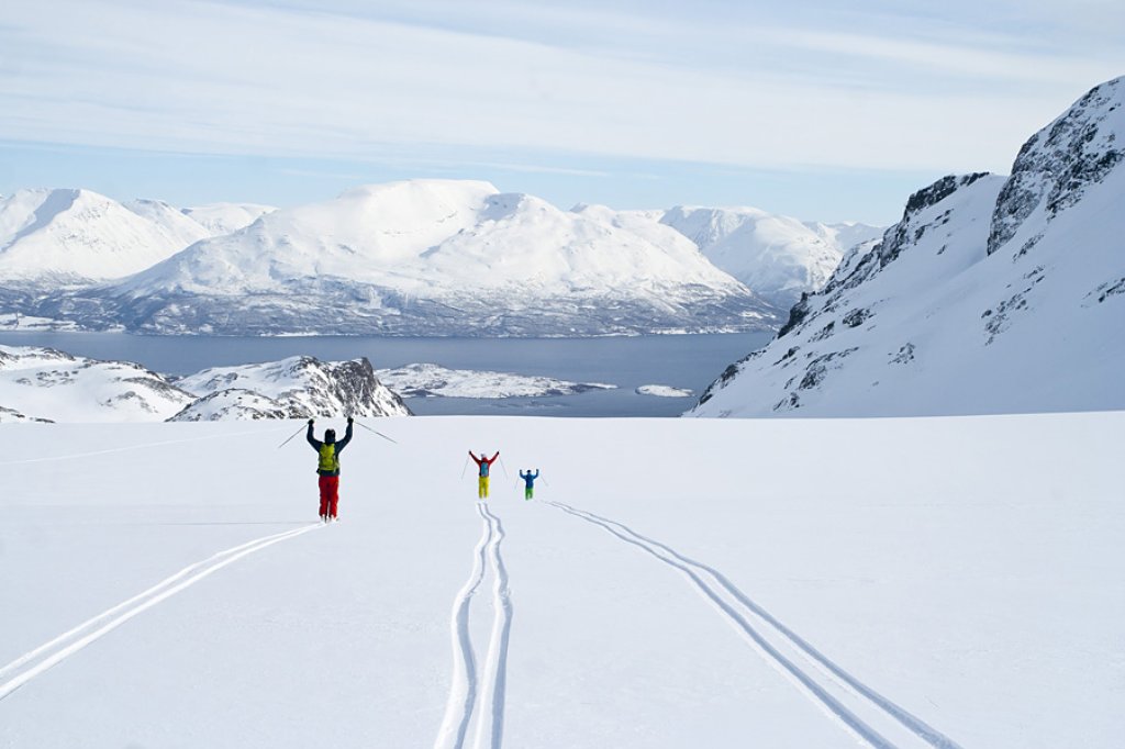Skiing in a unique fjord landscape up to sea level in the Lyngen Alps.