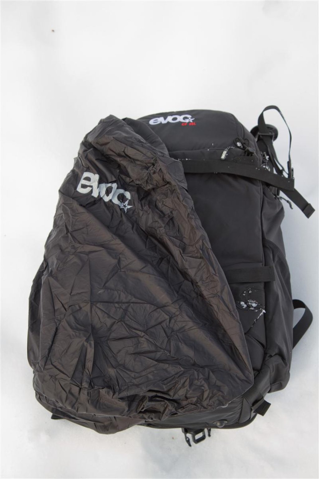 The integrated rain cover is removable and is stored in a compartment in the bottom of the backpack