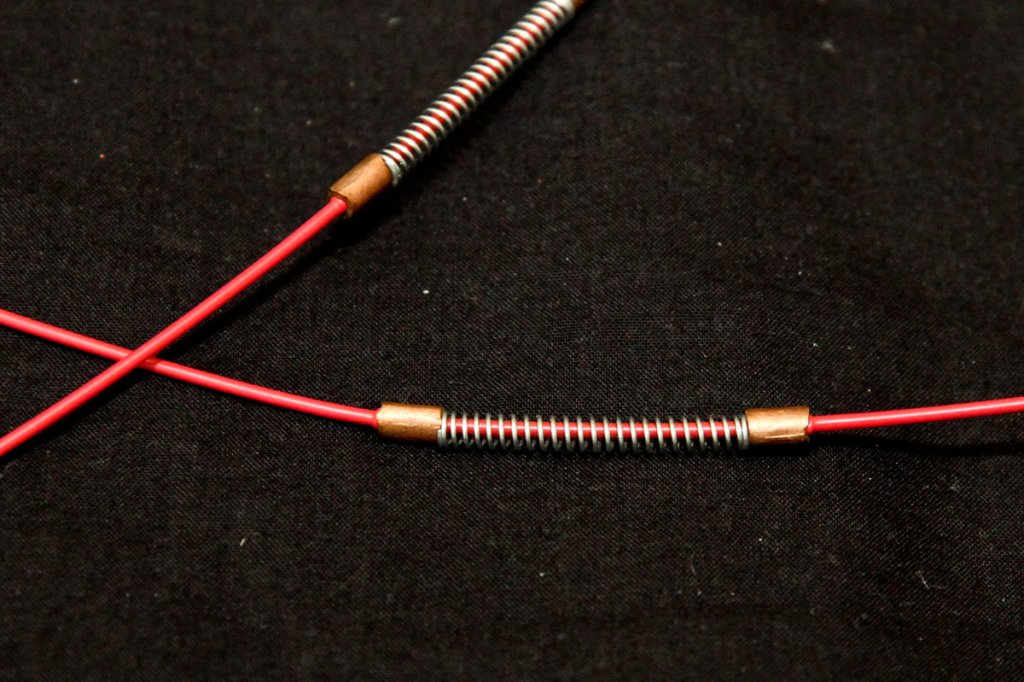 The trick: spring coils held in position by copper sleeves