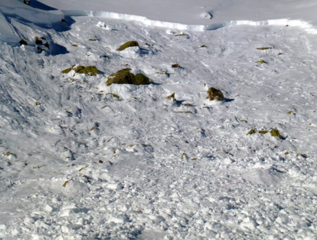 A slab avalanche triggered by a person, which had started in a very weak layer - a so-called persistent (long-lasting) weak layer - deep in the snowpack.