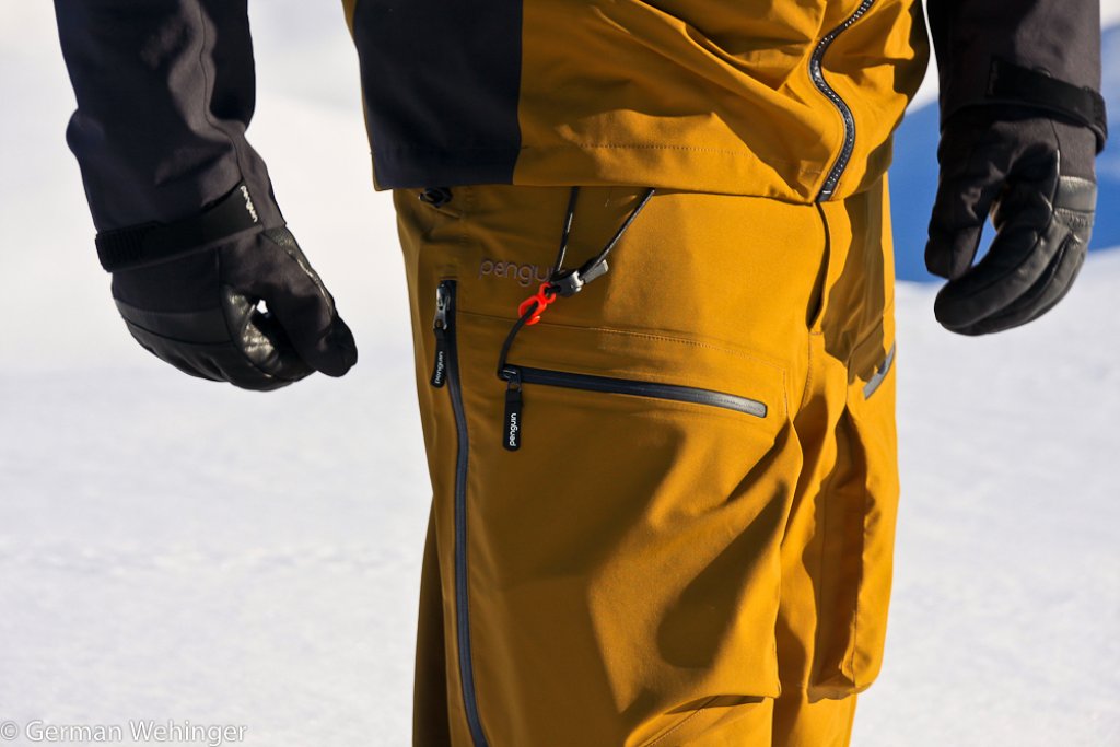 I like to carry the avalanche transceiver in my trouser pocket - quick access and no need to open the jacket!