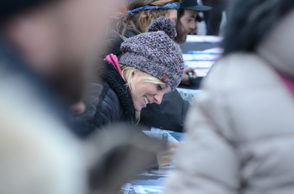 Anne-Flore Marxer, ranked 2nd overall in the women's snowboarding category in 2016, signs autographs.