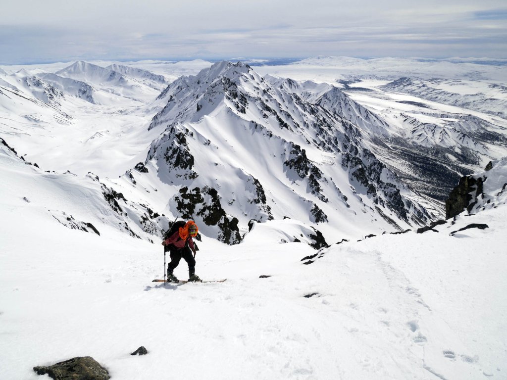 Arrival on the shoulder leading to the summit. View to the south.