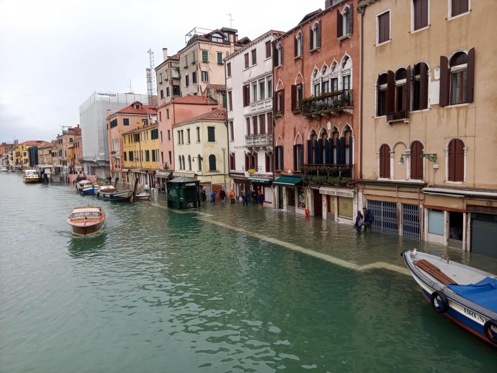 Canal on the sidewalk in Venice at the weekend.