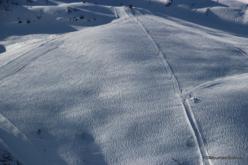 Heavily tracked terrain in the ski area