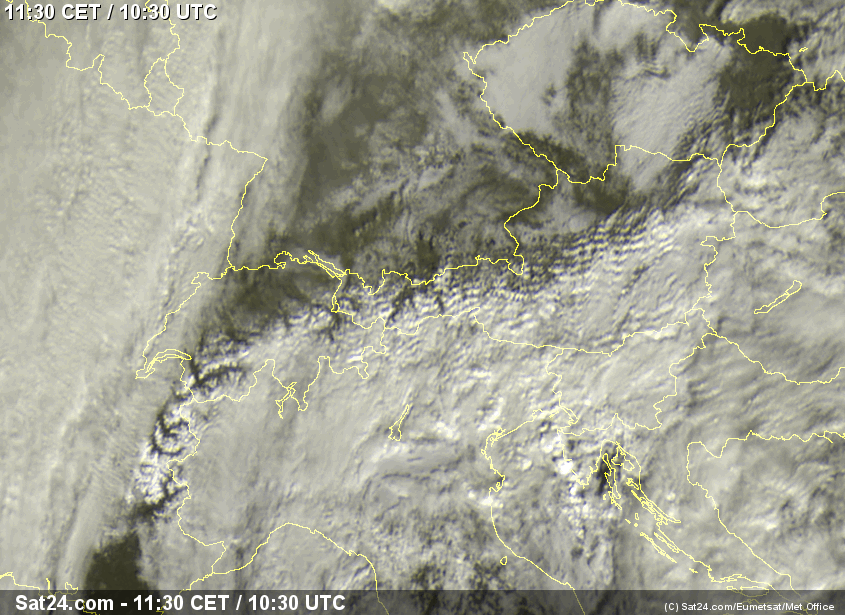 Satellite image from the first of February. Dusty clouds south of the main ridge, lee waves with foehn in the north.